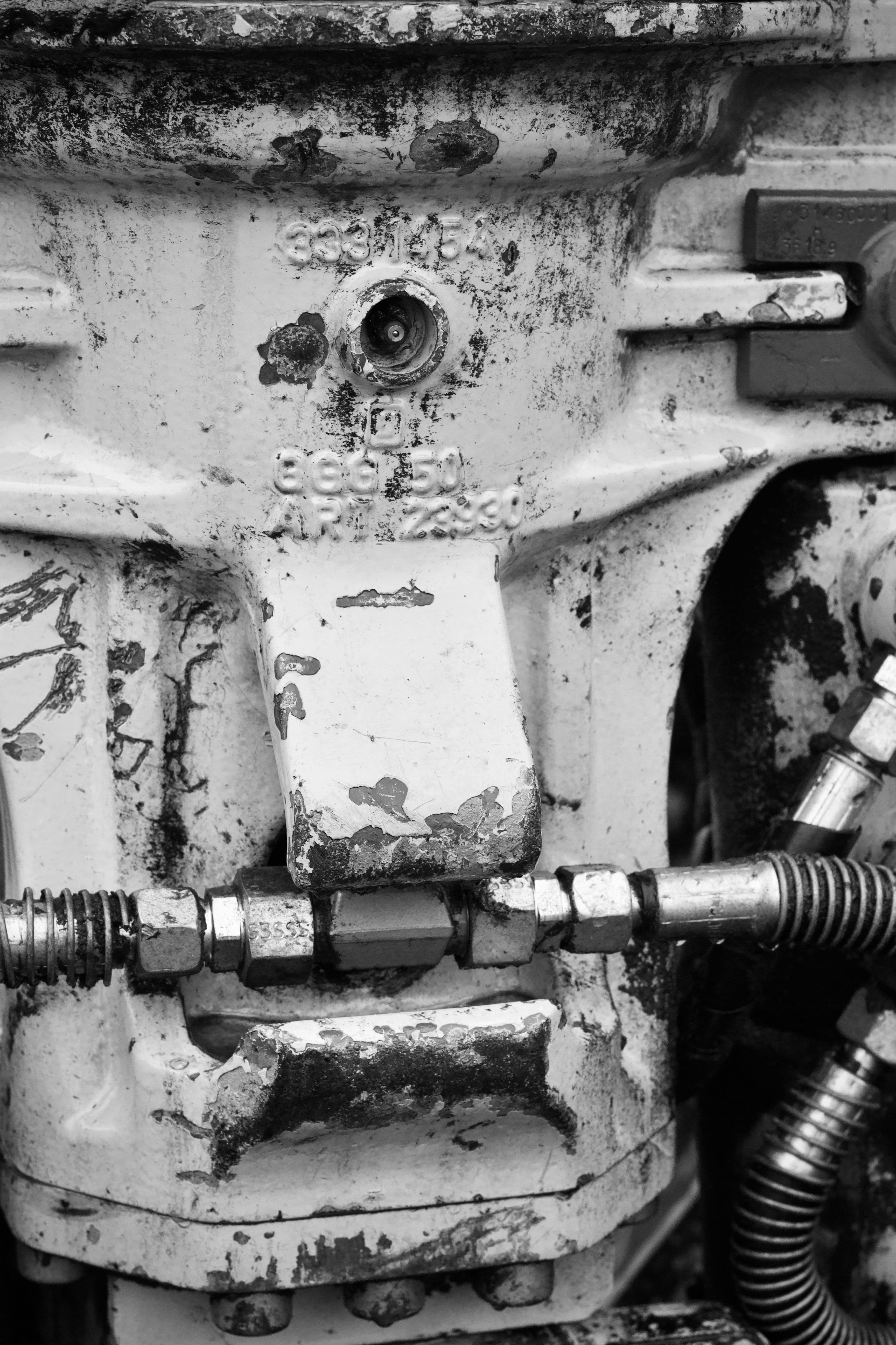 Close-up of machined gears inside industrial equipment